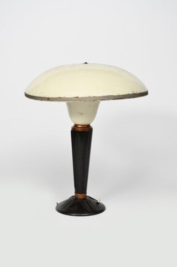 An enamelled metal and bakelite type 320 desk lamp designed by Eileen Gray, probably Jumo, the flaring bakelite base cast with ribs, with copper band below white enamelled collar and shade, unsigned, 47cm. high