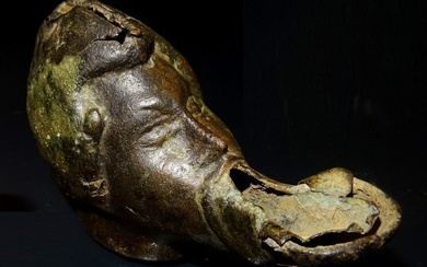 Ancient Roman Bronze Oil lamp in the shape of a human head with an oversized mouth - extremely rare!