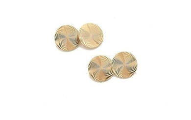 BULGARI Pair of cufflinks in guilloché 18K yellow gold (750‰) with a radial pattern