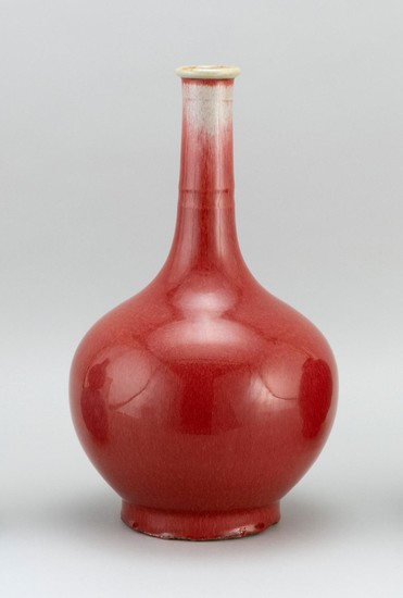 CHINESE PEACHBLOOM PORCELAIN BOTTLE VASE With molded rim and neck. Label on base for Gilman Collamore & Co., 5th Ave and 30th St, Ne...