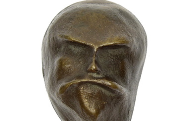 Cast bronze paperweight, shaped like a face, design Erich Wichman...