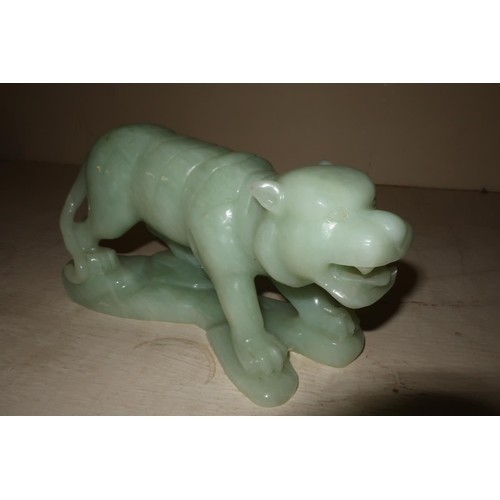 Chinese carved hard stone figure of a tiger (length 21cm)