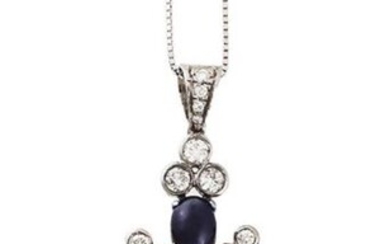 Cross pendant in white gold with cabochon sapphires...
