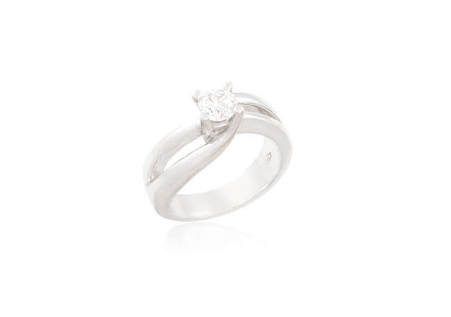 Description A SINGLE-STONE DIAMOND RING The round brilliant-cut diamond...