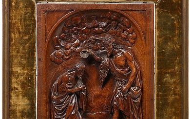 Elément décoratif, bas-relief dans une niche en noyer sculpté représentant le "Baptême du Christ". Travail français, probablement Ecole de la Loire. Epoque: fin XVIème - début XVIIème. (Petits éclats et ** à un bras). Dim.:+/-25,6x20,7cm.