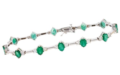 Emerald and diamond bracelet with a line of twelve oval mixed cut emeralds, each flanked by two brilliant cut diamonds in white gold setting, estimated total diamond weight approximately 1ct, lengt...