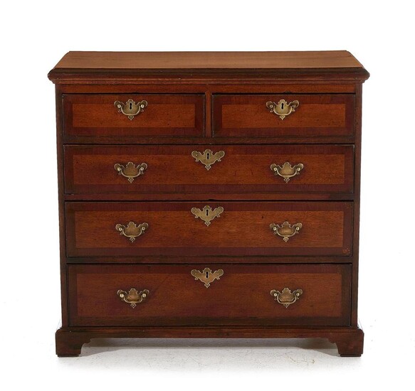 English oak and mahogany chest of drawers