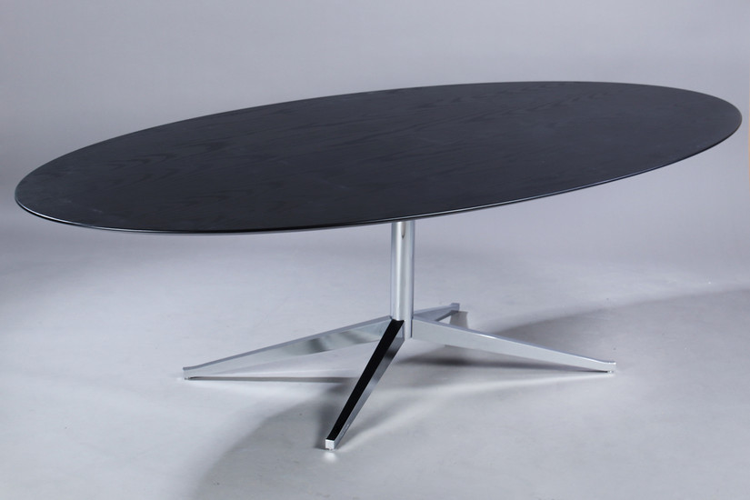 Florence Knoll. Dining table/conference table, oval top in black-glazed wood