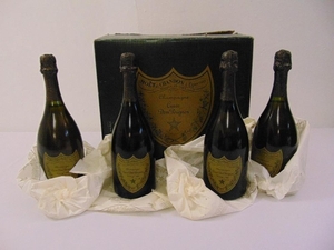 Four Dom Perignon vintage 1980 75cl bottles and an original ...