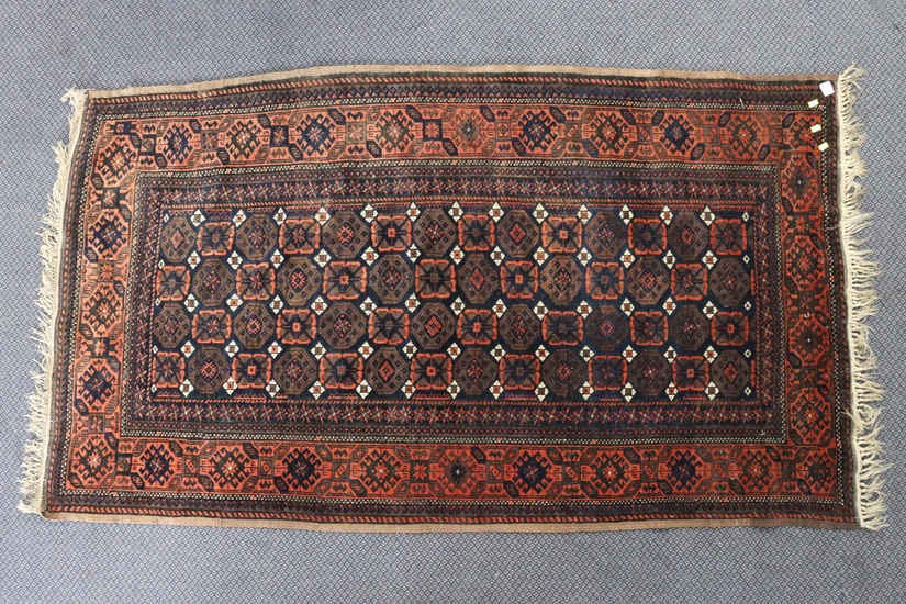 HAND KNOTTED PERSIAN WOOD FLOOR RUG, MESHED BELUCH DOZAR, MEASURES 106 X 188CM, NAVY FIELD WITH SMALL GULL MOTIFS REPEATING