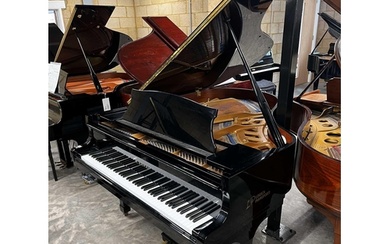 Kawai (c1984) A 5ft 8in Model KG-2D grand piano in a bright ...