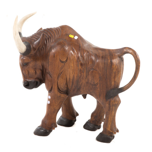 Large carved wood bull