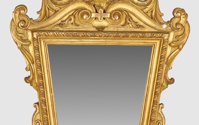 Miroir mural Napoléon III Bois, stuqué et doré. Cadre de miroir trapézoïdal et profilé, entouré...