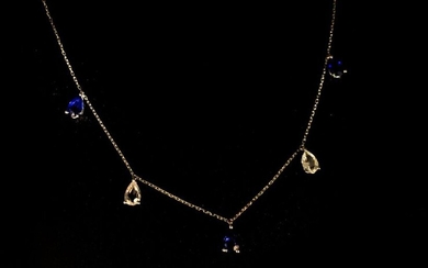 NECKLACE NECKLACE in white gold, adorned with five blue and...