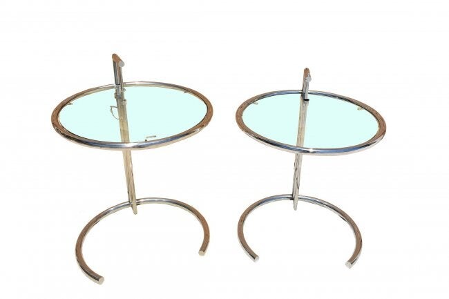 PAIR GLASS AND CHROME ADJUSTABLE SIDE TABLES