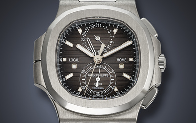 PATEK PHILIPPE, VERY RARE STAINLESS STEEL FLY-BACK CHRONOGRAPH DUAL TIME 'NAUTILUS', RETAILED BY TIFFANY & CO, REF. 5990/1A-001