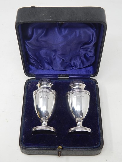 Pair of Edwardian Silver Peppers of Baluster weighted form, ...