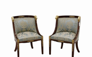 Pair of armchairs in the Empire style.