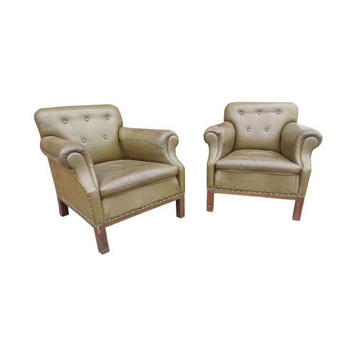 Pair of early 20th C. oak and leather upholstered club chair...