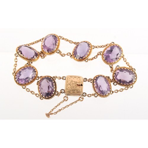 Property of a deceased estate - a 9ct yellow gold amethyst b...