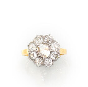 RING in 18K yellow gold and platinum with a flower...