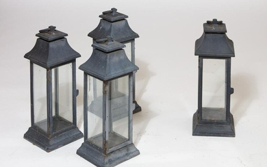 Set of four large ebonized metal hanging lanterns