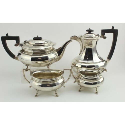 Silver four piece tea set comprising hot water jug, teapot (...
