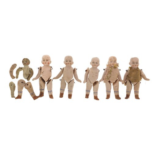 Six miniature German bisque dolls with jointed limbs, each 7...