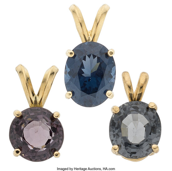 Spinel, Gold Pendants Stones: Round-cut gray-purple spinel weighing 2.21...