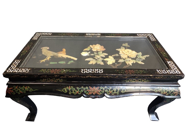 Table, low rectangular top, on four curved legs, richly inlaid with mother-of-pearl inlays in flora