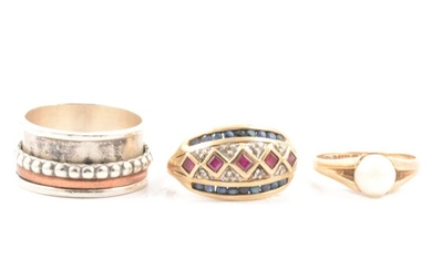 Three dress rings, pearl, silver and sapphire and ruby.