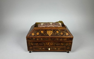Work box in straw marquetry with decoration of flowered branches. It opens to a drawer and a flap revealing cases and boxes in straw marquetry.