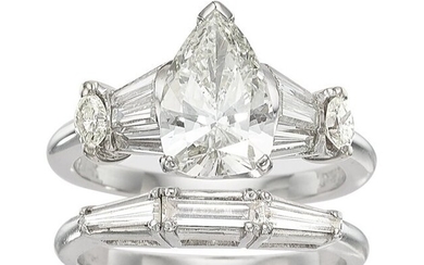 10036: Diamond, Platinum Ring Stones: Pear-shaped diam