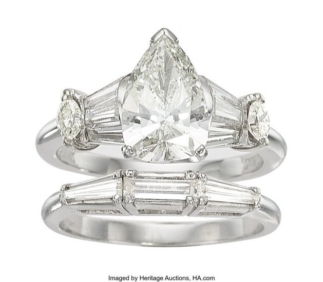 10036: Diamond, Platinum Ring Stones: Pear-shaped diam