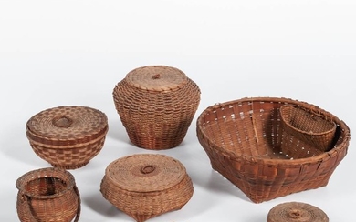 Seven Small Splint Baskets, late 19th/20th century, five lidded baskets, a kettle-form basket, and a round work basket, wd. to 11 1/2 i