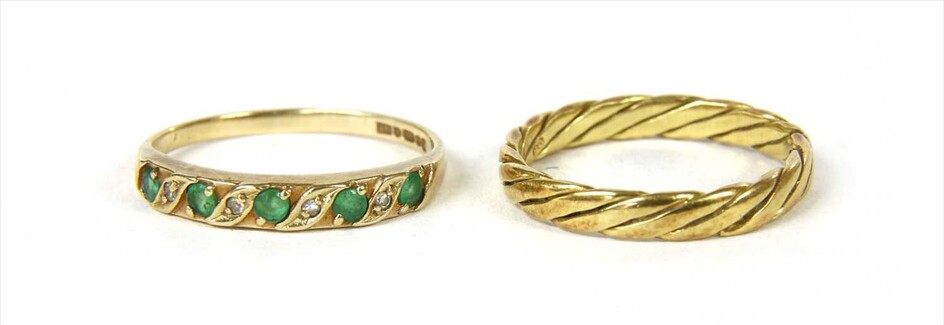 An 18ct gold twist design wedding ring