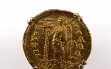 18K gold ring presenting a gold coin of the Byzantine Empire with the profile of Anastasius (expert opinion). TDD: 51. Gross weight : 8 gr. A gold ring.