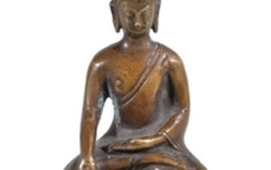 A Nepalese style small bronze Buddha, seated on a
