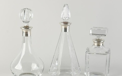 3 decanters with silver