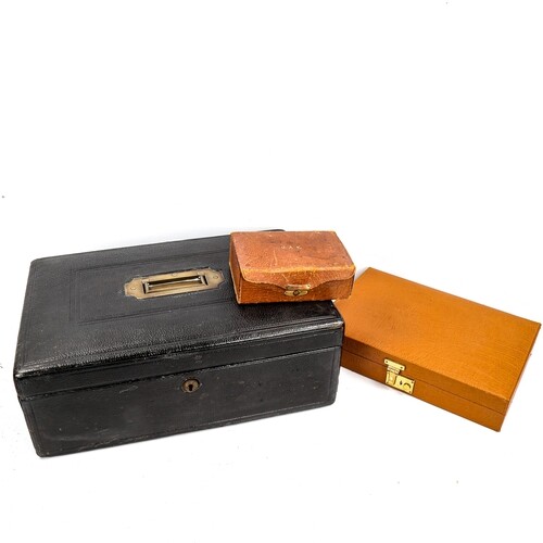 3 leather-covered boxes, comprising a tan leather jewel box,...