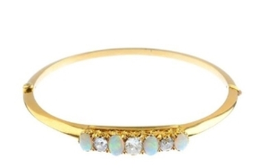 An early 20th century 15ct gold opal and diamond hinged