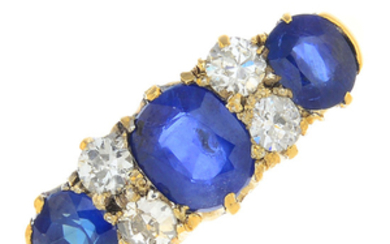 An early 20th century 18ct gold sapphire three-stone and diamond ring.
