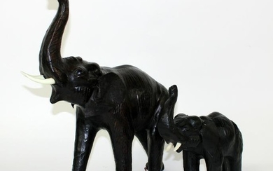 Omersa style leather wrapped elephant statues