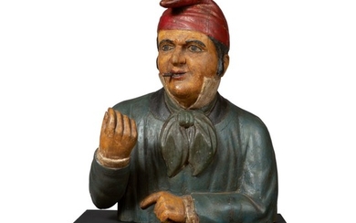 FINE AND RARE CARVED AND POLYCHROME PAINT-DECORATED PINE COMICAL TOBACCONIST BUST TRADE FIGURE, ATTRIBUTED TO THE SAMUEL ROBB WORKSHOP, NEW YORK, CIRCA 1880