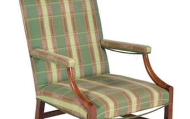 A mahogany and upholstered library armchair