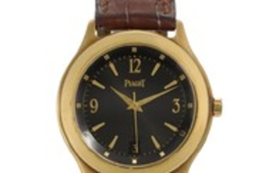 PIAGET | A YELLOW GOLD AUTOMATIC CENTRE SECOND WRISTWATCH WITH DATE REF 26001 CASE 801779 CIRCA 1995