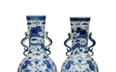 A PAIR OF CHINESE BLUE AND WHITE 'DRAGON' VASES 19…