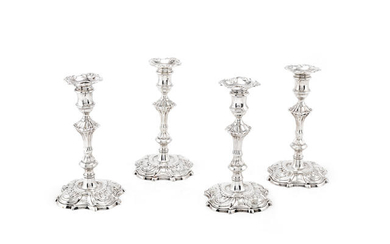 Inner Temple interest: a set of four George II silver candlesticks
