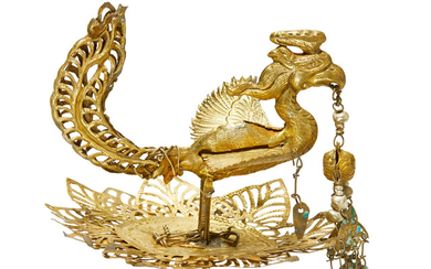 A rare gilt silver head ornament in the form of a phoenix