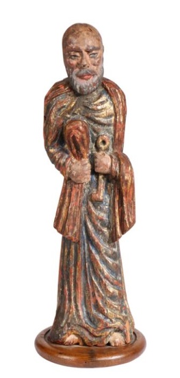 A 17th/18th century Spanish Colonial carved and painted figure of St PeterDressed in blue, red and golden robes and clutching a key, 49cm high